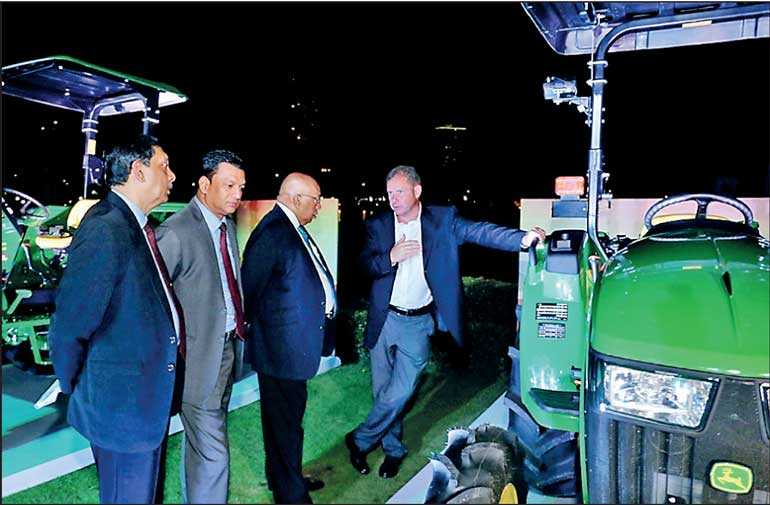 Singer launches John Deere 4WD tractors to Sri Lankan market Daily FT